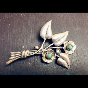 Charming vintage solid sterling silver brooch.Small turquoise accents.
